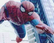 Spiderman floats above the crown, thanks to helium.