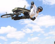 Picture of Dave Mirra launching a big air on his BMX bike during the X Games.
