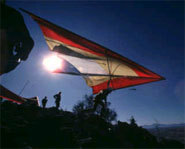 Picture of a hang glider as he takes to the skies.