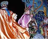 Everyone puts on masks and costumes for Mardi Gras.