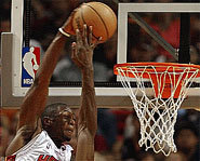 Picture of Dwyane Wade going for a dunk.