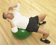 Crunches using an exercise ball can be a great ab workout.