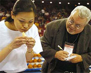 Sonya Thomas is a competitive eater who usually defeats her male competitors.