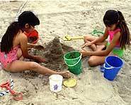 Building sand castles is great fun on the first day of summer.