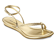 Pick up a pair of gladiator sandals in a metallic shade.