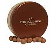 Get a great sunless tan with products like Body Shop's Brush On Beads.