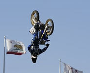 Picture of freestyle motocross rider Nate Adams doing tricks at the 2004 X Games.