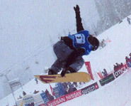 Picture of snowboarder riding the Halfpipe at Snowboarding World Cup event in Whistler, Canada.