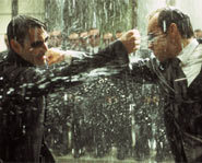 Agent Smith, played by Hugo Weaving battles with Neo, played by Keanu Reeves, in The Matrix Revolutions.