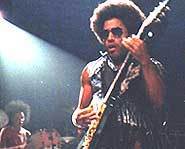 Lenny Kravitz concert review: Lenny rocks out on the guitar.
