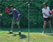 Slap that ball! Get your friends together for a game of Mookie Swing Ball.