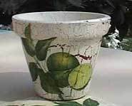 You can make your own decoupage flower pot for Mom.