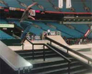 Skateboard slides a rail at the 2004 Slam City Jam in Vancouver.