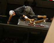 Bucky Lasek lauches off the vert ramp on his skateboard at the X Games.