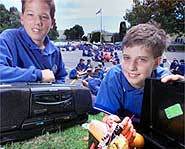 Nic and another student who also made an invention.