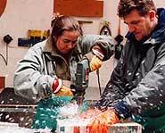 Duncan Hamilton gets help creating an ice sculpture.