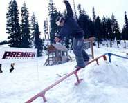 Riding a rail on a JP Walker Snowskate