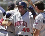 Torii Hunter is often been seen chasing fastballs from Jason Bere.