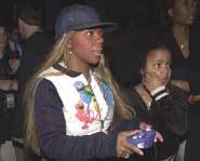 Lil' Kim kickin' it on a Gamecube.