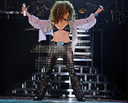 Dressed in leather - ready to rock J. Lo sports a hairdo like Slash of Guns 'n Roses.