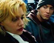 Brittany Murphy teams up with Eminem in the flick 8 Mile.