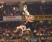 Carey Hart flies off his motorcross at the X Games.