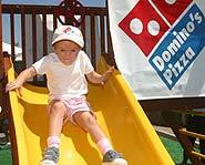 Three year-old Jessica recieved a new playground from Dominos Pizza for her wish.