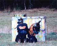 Paintball players wearing their gear ready to wage war!