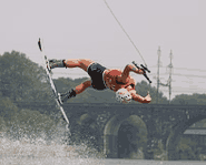 Dallas Friday gets big air on a wakeboard at the 2003 Summer X Games.