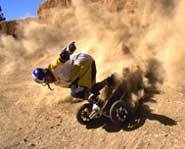 Mountainboarding on a sand dune.