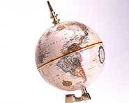Globes show the land and ocean on Earth.