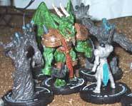 Mage Knight has awesome dragon figures that you can lead into battle to smash your opponent!