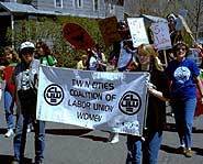 Women march on Labor Day.