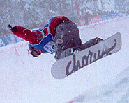 A snowboarder rides through a halfpipe during a World Cup Snowboarding event.