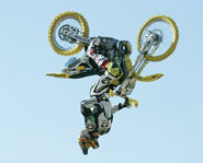 Travis Pastrana does a backflip at the 2003 X Games.