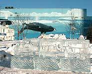 An ice sculpture and Wyland's Whaling Wall mural.