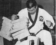 Breaking boards in martial arts takes professional training, proper set up and strong hands.