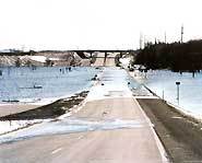 Never try to cross a flooded road.