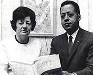 Betty and Barney Hill with a book they wrote about the abduction.