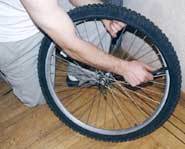 Give the glue about three minutes to dry on the tire.