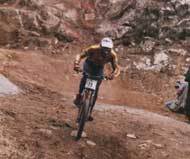 Cruising 'round a turn on a downhill course.