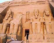 Ramesses II on his own temple, alongside one of his many wives.
