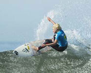Pic of surfer Anastasia Ashley riding a wave.