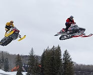 DJ Eckstrom and Blaire Morgan get big air in the Snocross at the Winter X Games