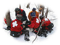 Helping out an injured skier.