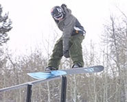 Photo of slopestyle snowboarding.