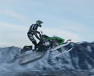 Photo of Tucker Hibbet racing snowmobiles.