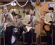 Weezer goes back in time to the set of Happy Days in the video, Buddy Holly.