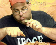 Photo of World Champion eater, Cookie Jarvis, at a competitive eating contest.