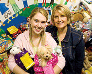 Annie Wignall with her Care Bags for kids!
